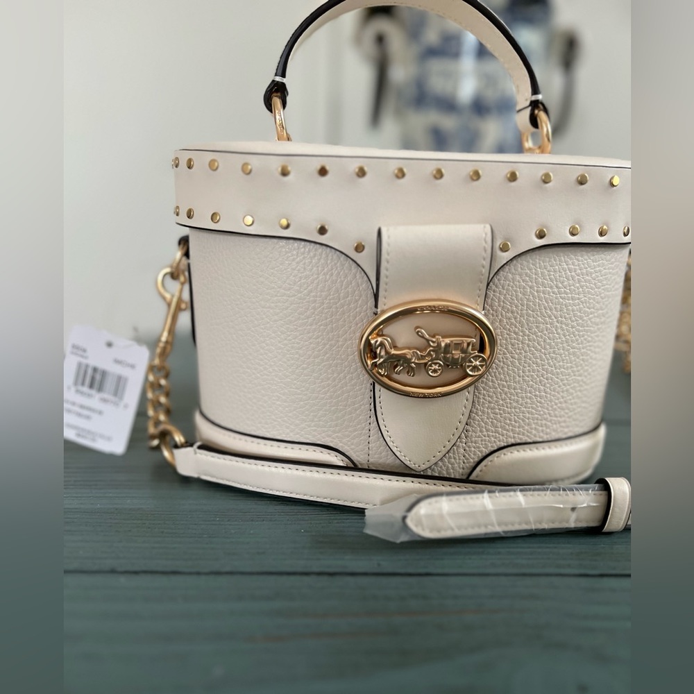 Brand new Coach bucket purse with gold hardware